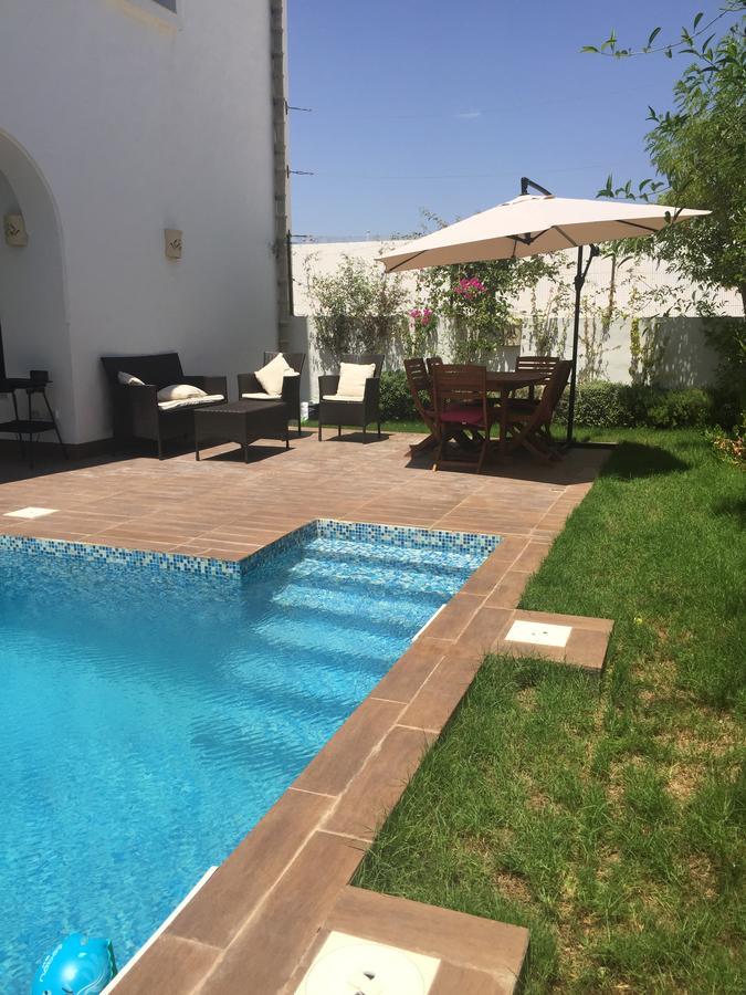 Villa Avec Piscine Triffa Bagian luar foto